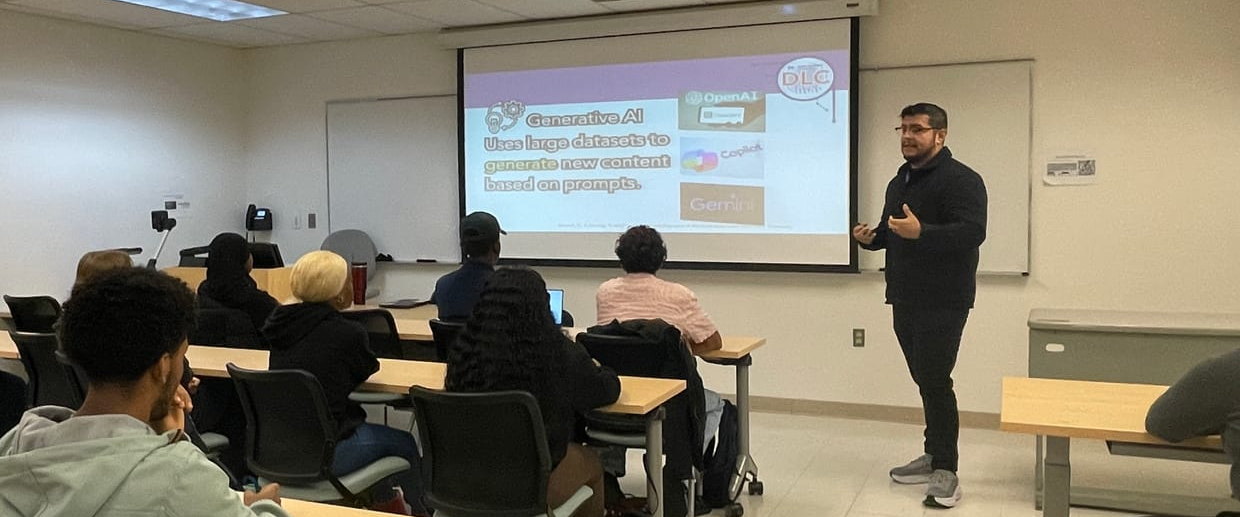 Daniel Umana speaking beside a projected slide about generative AI to a classroom of seated students at Montgomery College.